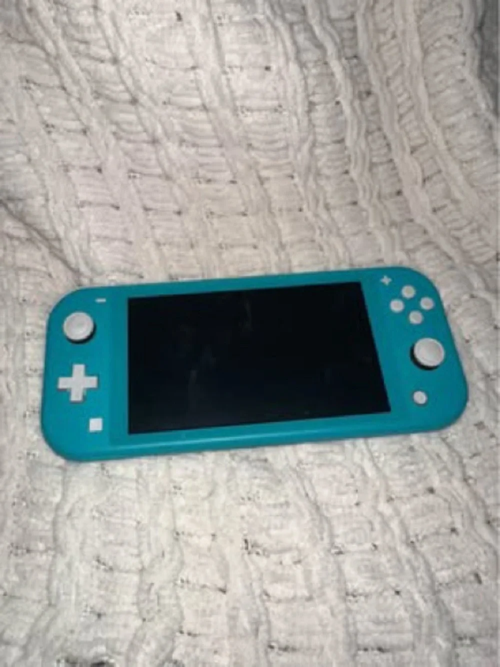 Turquoise Handheld Ninetendo Switch Lite - Portable Video Game System